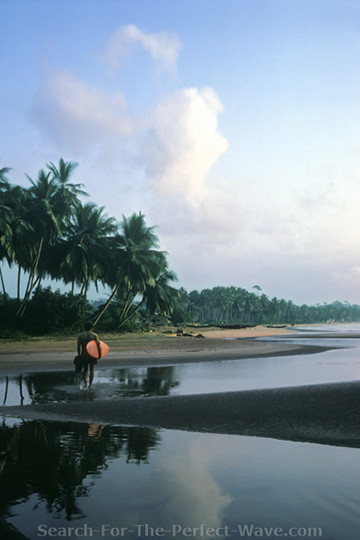 Kevin Naughton hunting for Surf in Ghana, West Africa. Photo by Craig Peterson